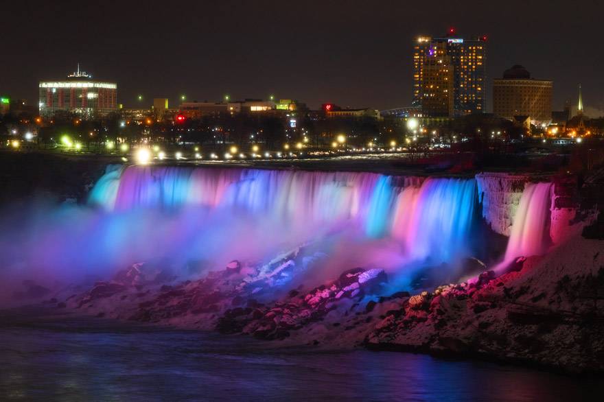 A colorful illumination of Niagara Falls