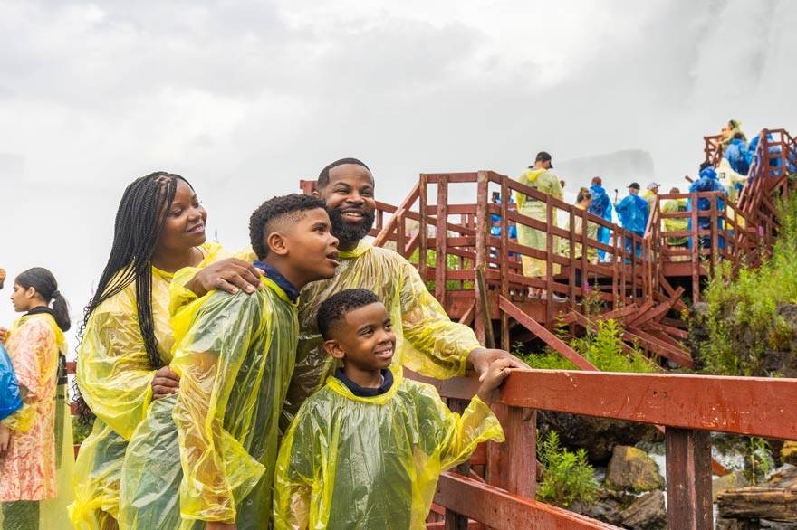 A family on their way to the Cave of the Winds at Niagara Falls