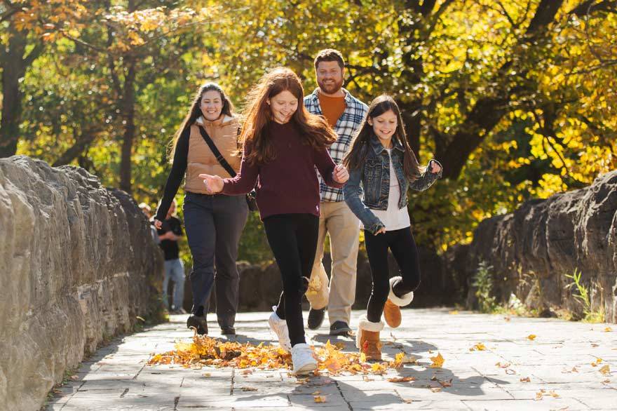 A family on a fall hiking trail at Niagara Falls