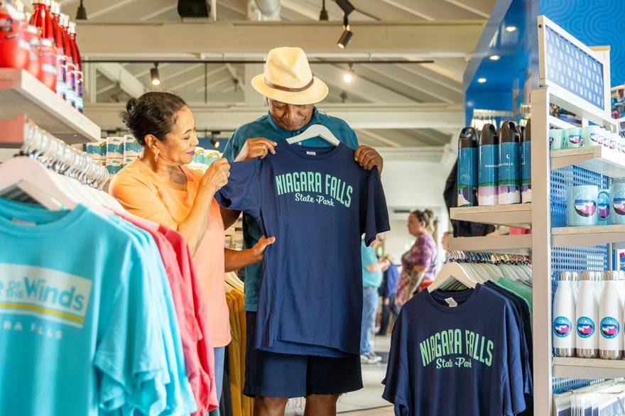 A couple shopping in a gift shop at Niagara Falls