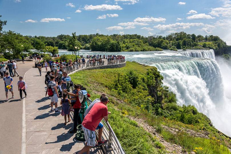 A crowd taking in a view of Niagara Falls